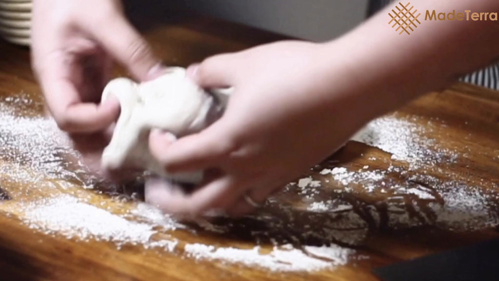 Gently raise the top of your dough