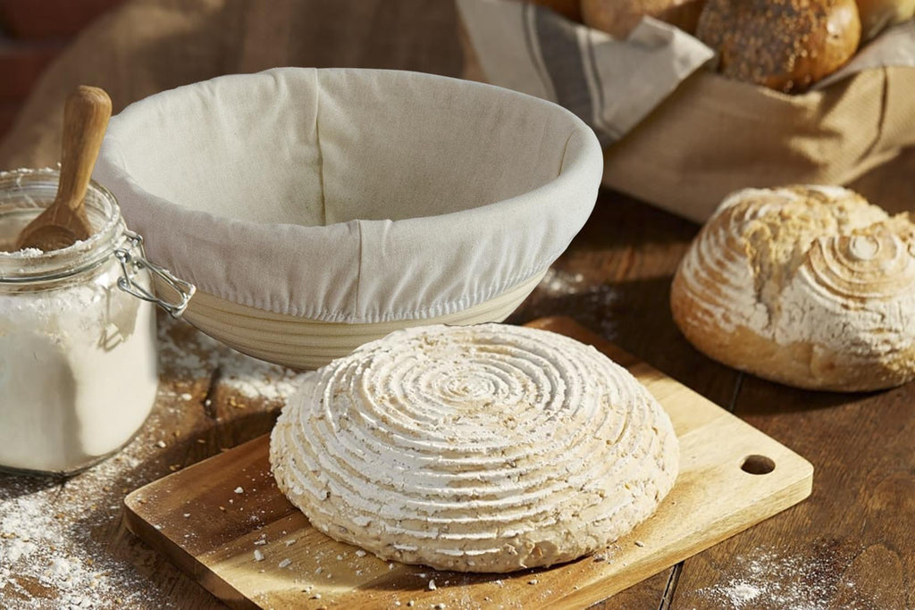 high hydration sourdough bread banneton proofing basket with dough 